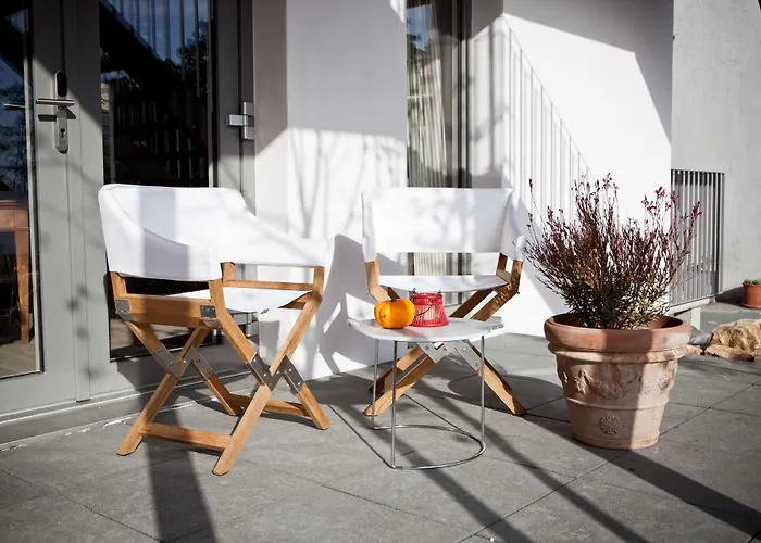 Le Coq Chantant And Boutique Hotell