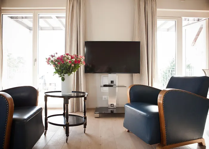 Le Coq Chantant And Boutique Hotell