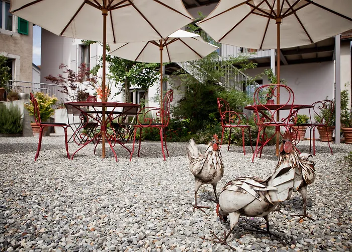 Le Coq Chantant And Boutique Hotell